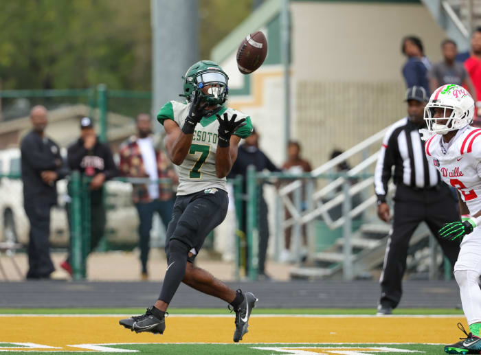 Antonio Pride hauls in a touchdown reception in No. 2 DeSoto's upset of Duncanville on Saturday.